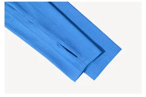 Close-up detail of the ribbed knit sleeve cuff featuring a thumbhole on a blue yoga jacket