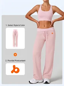 Close-up of pink wide-leg yoga pants featuring a high-waist drawstring design.