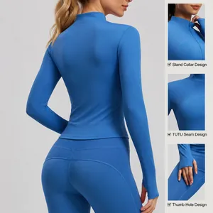 Blue slim fit mock neck yoga set featuring striped patchwork and thumb hole details