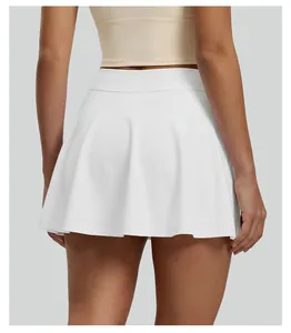 Detailed back view of a white high-waisted pleated tennis skirt designed for summer sports.