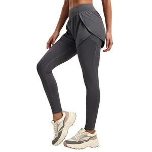 Dark gray high waist fake two-piece yoga pants with side pockets for fitness sports.