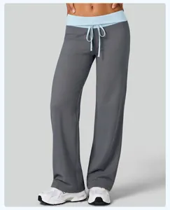Women's gray yoga pants featuring a light blue fold-over waistband and adjustable drawstring.
