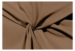 Macro detail of the elegant front twist knot on a coffee brown pleated athletic skirt