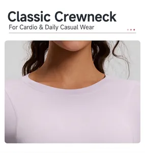 Detail view of the classic crew neck stitching on a lavender slim-fit yoga top