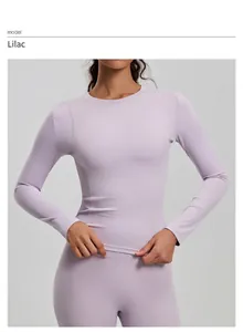 Slim fit long-sleeve lavender yoga top for fitness and running.