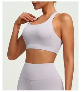 Close-up view of a light purple sports bra with a supportive wide band and high elasticity.