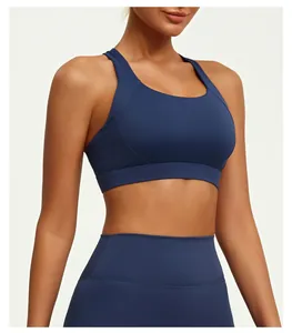 Close-up of navy blue high-stretch yoga sports bra showing soft fabric texture.