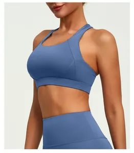 Side view detail of a blue racerback sports bra showing stitching and fabric texture.