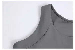 Detailed close-up of gray nude-feel sports bra neckline and stitching for fitness.