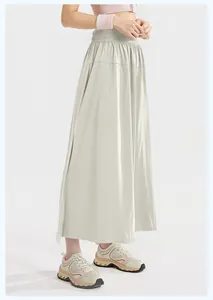 Detail shot of loose beige Yamamoto style sports culottes with comfortable elastic high waist