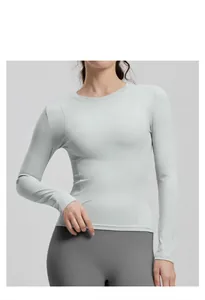 Detail view of sky blue round neck slim fit yoga top shown on model for fitness wear