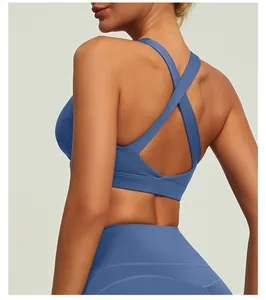 Detail of the cross-back design on this blue high-stretch nude-feel yoga sports bra