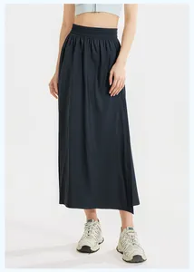Detailed view of women's black high-waisted A-line sports skorts in a studio setting