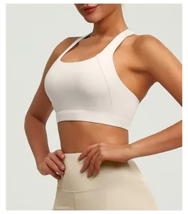 Detailed side view of white back cross yoga bra featuring soft, high-elasticity fabric
