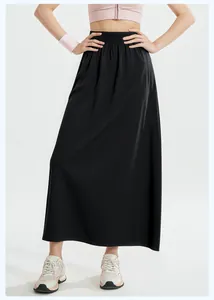 Detailed view of loose black A-line sports culottes with high-waisted elastic band