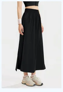 Full-length view of black loose wide-leg skort with elastic waistband on model
