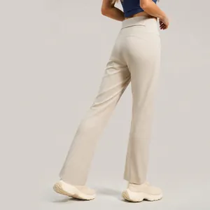 High-waisted wide-leg yoga pants with contouring back seams and peach-lift effect.