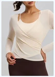 Close-up of cream-colored breathable mesh yoga top and camisole set for fitness