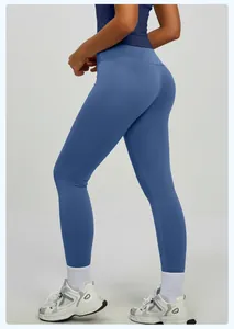 Vista posteriore dei leggings da yoga blu modellanti con effetto push-up per fitness