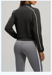 Detailed back view of a black athletic jacket with white contrast side stripe design