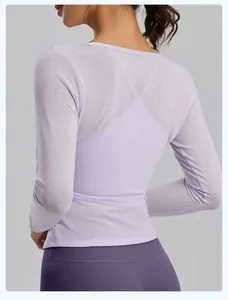 Close-up of the breathable mesh back design on a lavender yoga long-sleeve top