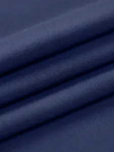 Professional macro shot of navy blue double-sided nylon and elastane yoga bra fabric texture
