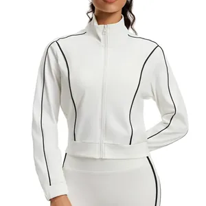 Women's white athletic zip-up jacket with black contrast piping for fitness and running