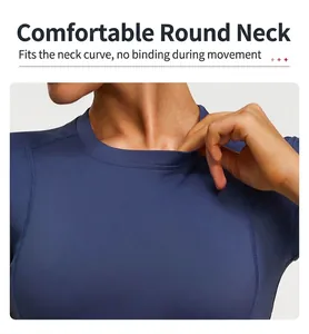 Detailed view showing the comfortable crew neckline on a blue athletic yoga top