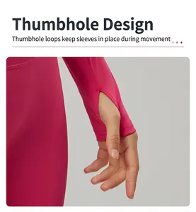 Detailed close-up showing the thumbhole cuff design on a pink fitness yoga jacket sleeve