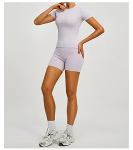 Premium slim fit lavender yoga set with short sleeve top and high-waisted gym shorts
