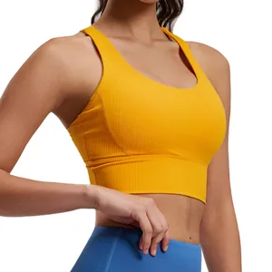 Sujetador deportivo acanalado amarillo con espalda cruzada para yoga y fitness
