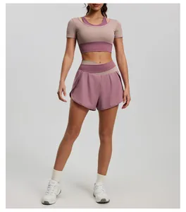 Two-piece color-block yoga set with short sleeve crop top and high waist shorts