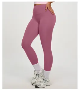 Détail du legging de yoga rose sans couture à taille haute pour le fitness et la course