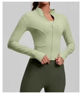 Detailed view of light green slim-fit athletic zip-up yoga jacket with thumbholes