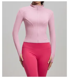 Professional slim fit pink yoga jacket featuring a front zipper and functional thumb holes detail