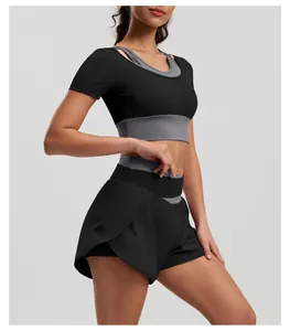 Side view of black and grey contrast color yoga set with high waist sports shorts