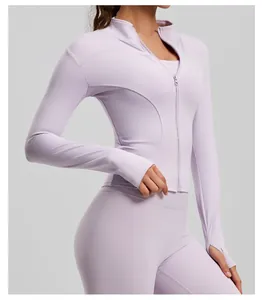 Detail view of a lavender slim-fit yoga jacket featuring a zipper and thumbhole cuffs.