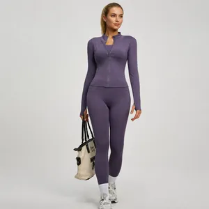 Set yoga due pezzi elasticizzato con giacca zip e leggings a vita alta