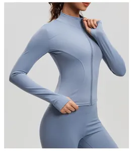 Slim fit light blue yoga jacket showing detailed texture and form-fitting design.