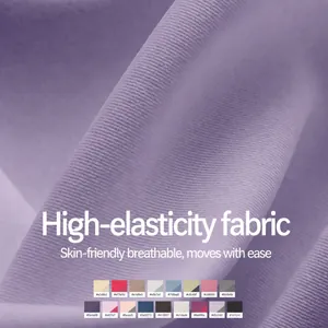Primo piano del tessuto elastico in poliestere spandex per completi sportivi con colori