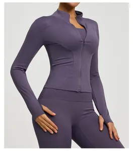 Detail shot of purple slim fit yoga jacket featuring front zipper and thumb holes