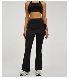 Black high-waisted flared yoga pants with ruched fake two-piece wrap skirt detail