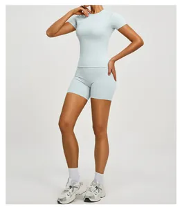 Full view of light blue slimming yoga set with short-sleeve top and training shorts