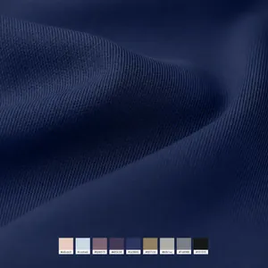 Close-up of high-stretch navy yoga fabric with multi-color palette swatches