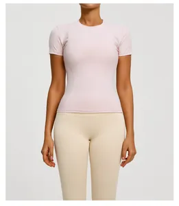 Detail view of slim fit short sleeve yoga top in soft pink, perfect for fitness and running