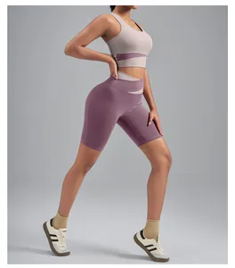 High-waisted yoga set featuring lavender biker shorts and a matching sports bra detail