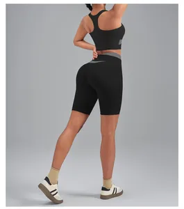 Detailed back view of high-waist black yoga biker shorts with peach butt lifting design