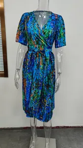 Front view of a vibrant blue V-neck floral print dress on a mannequin