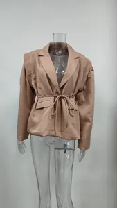 Front view of a stylish beige waist-tie blazer jacket shown on a transparent mannequin