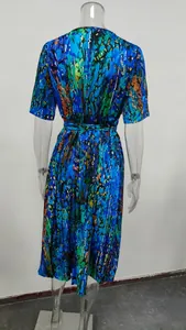 Back view of a blue floral print midi dress on a clear display mannequin